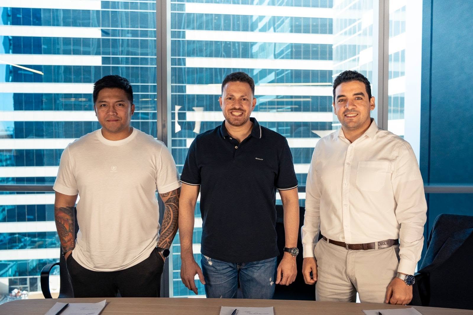 Ahmed Nabawy with co-founders in executive Dubai boardroom